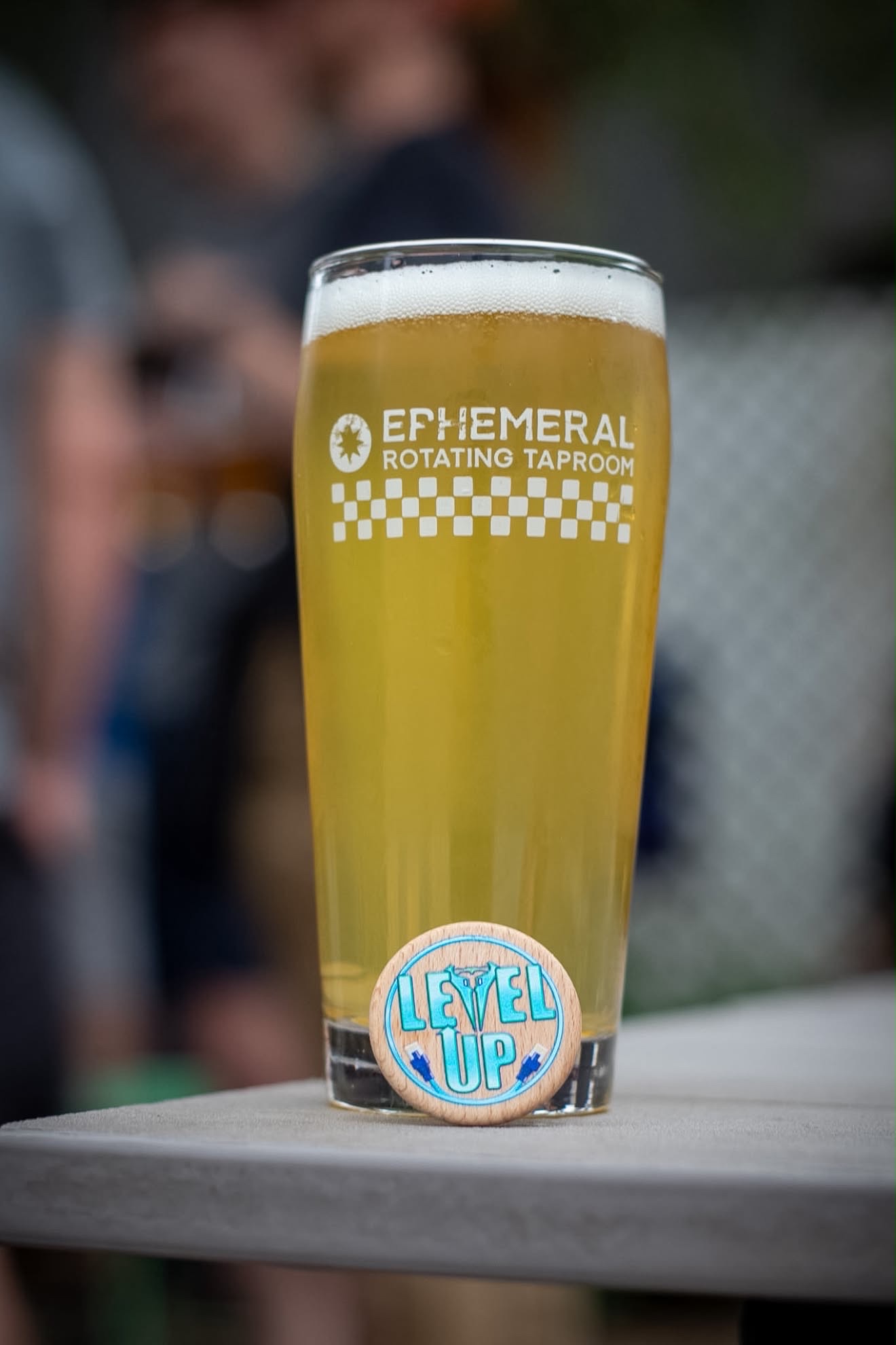 Beer with a Level Up coaster at Ephemeral Rotating Taproom